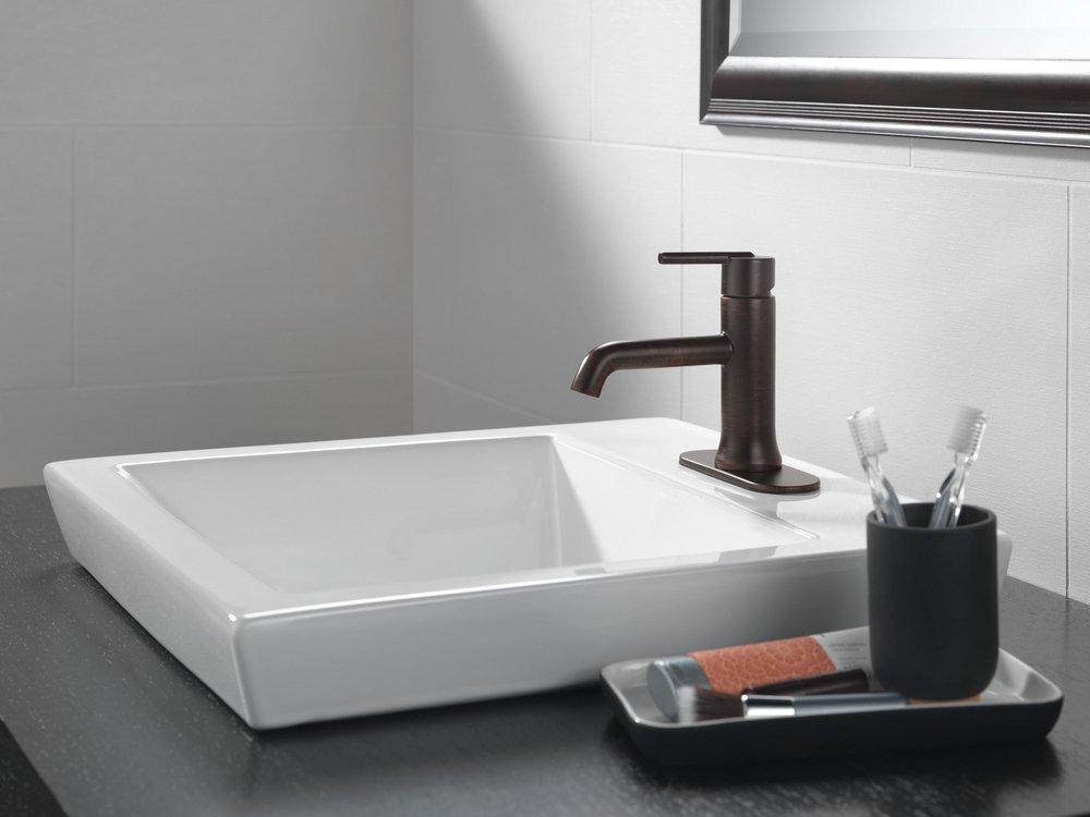 Delta Faucet Venetian Bronze Single Handle Monoblock Bathroom Sink Faucet with Metal Pop-Up Drain Assembly 