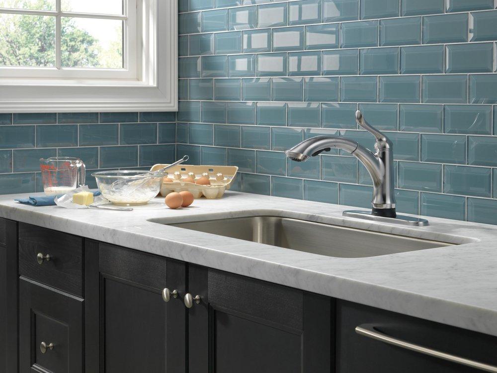 Delta Faucet Arctic Stainless Single Handle Pull Out Touch Activated Kitchen Faucet 