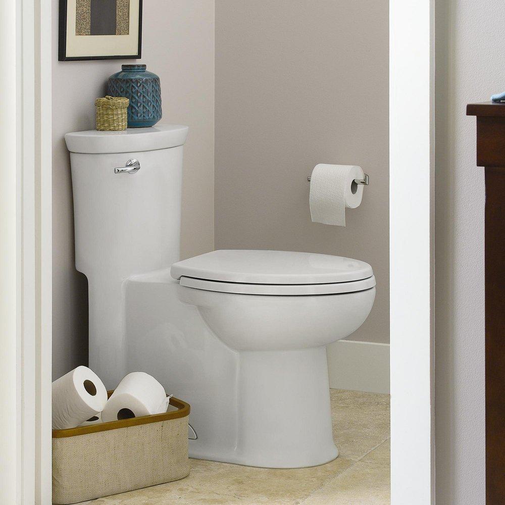 American Standard Linen 1.28 gpf Elongated One Piece Toilet with Left-Hand Trip Lever in Linen 