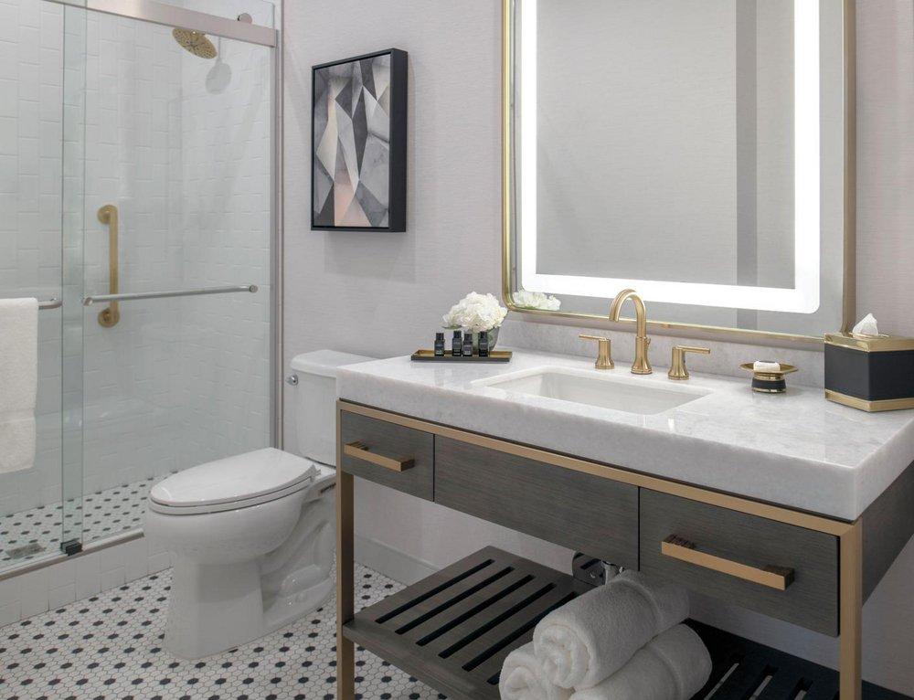 Delta Faucet Brilliance&reg; Champagne Bronze 18 in. Grab Bar 