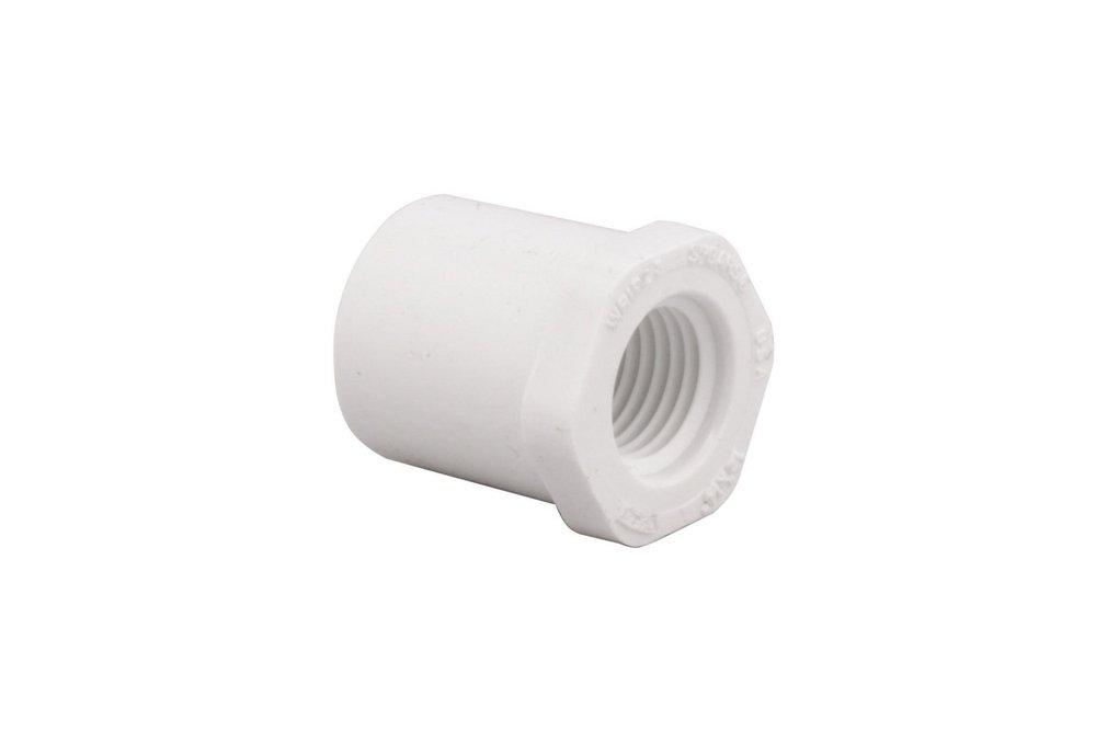 White Spigot x FPT Reducing Schedule 40 PVC Bushing 