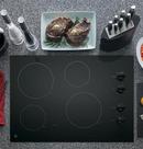 GE&reg; Black on Black 4 Burner Smoothtop Cooktop 