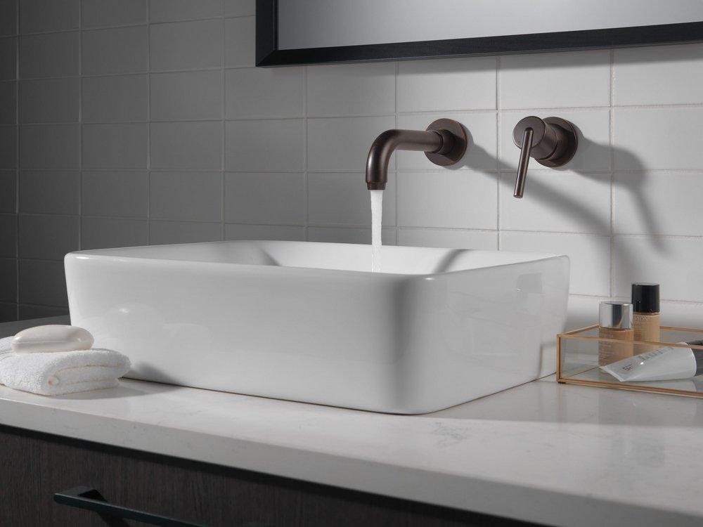 Delta Faucet Venetian Bronze Single Handle Wall Mount Bathroom Sink Faucet 