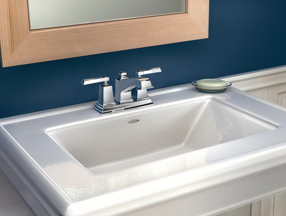 Moen Chrome Low Arc Bathroom Faucet with Double Lever Handle 