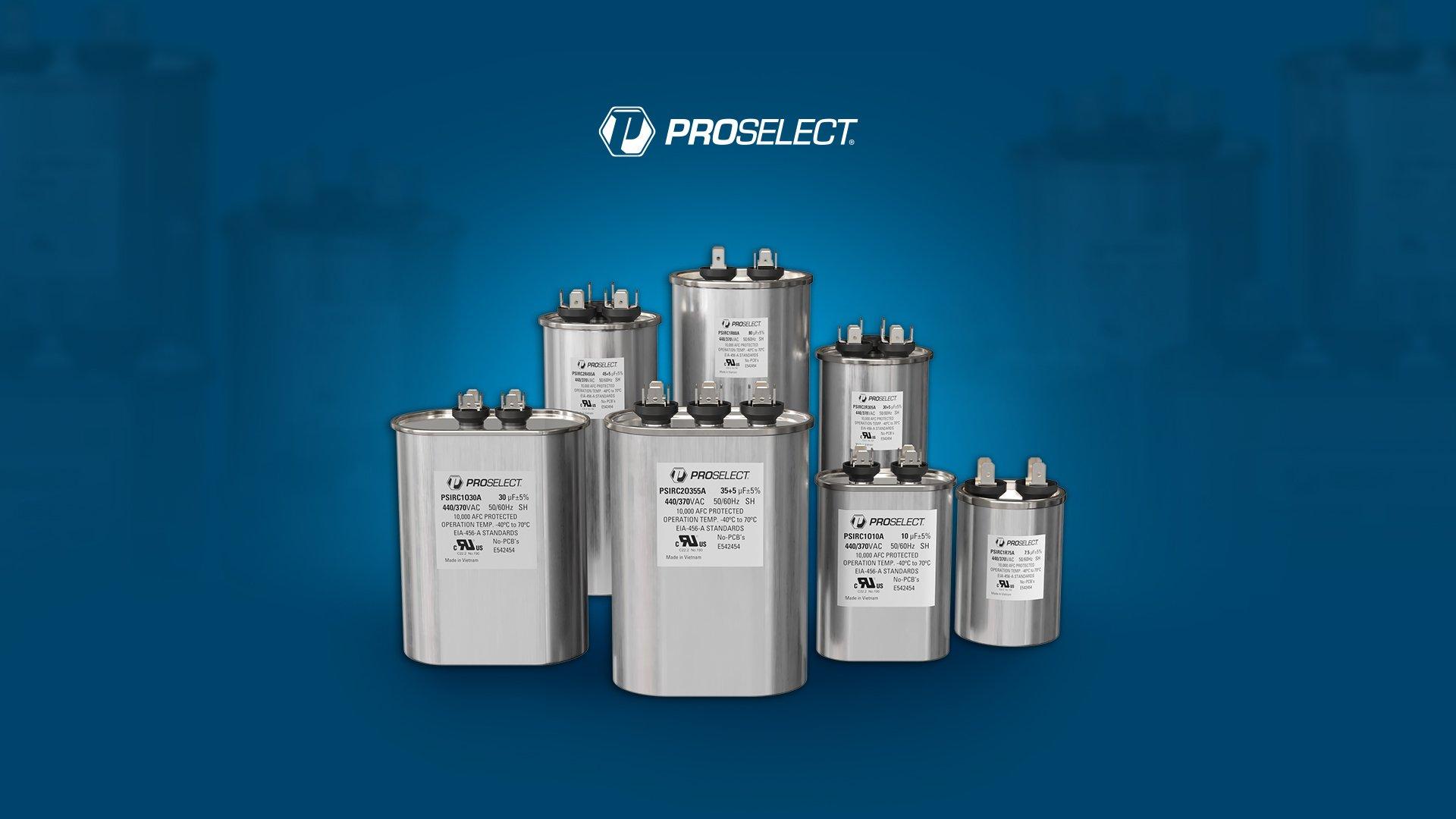 Silo image of 7 round and oval run PROSELECT Capacitors against blue background.