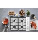 GE&reg; White 4 Burner Sealed Cooktop 