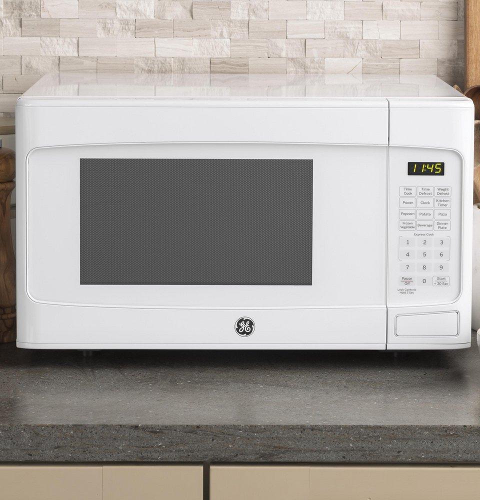 GE&reg; White 1.1 cu. ft. 950 W Countertop Microwave 
