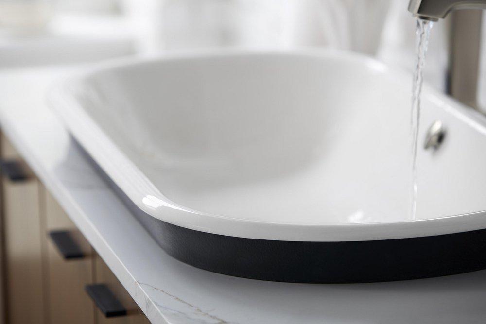 KOHLER White 33 in. Drop-in, Undermount, or Vessel Mount Oval Cast Iron Bathroom Sink 