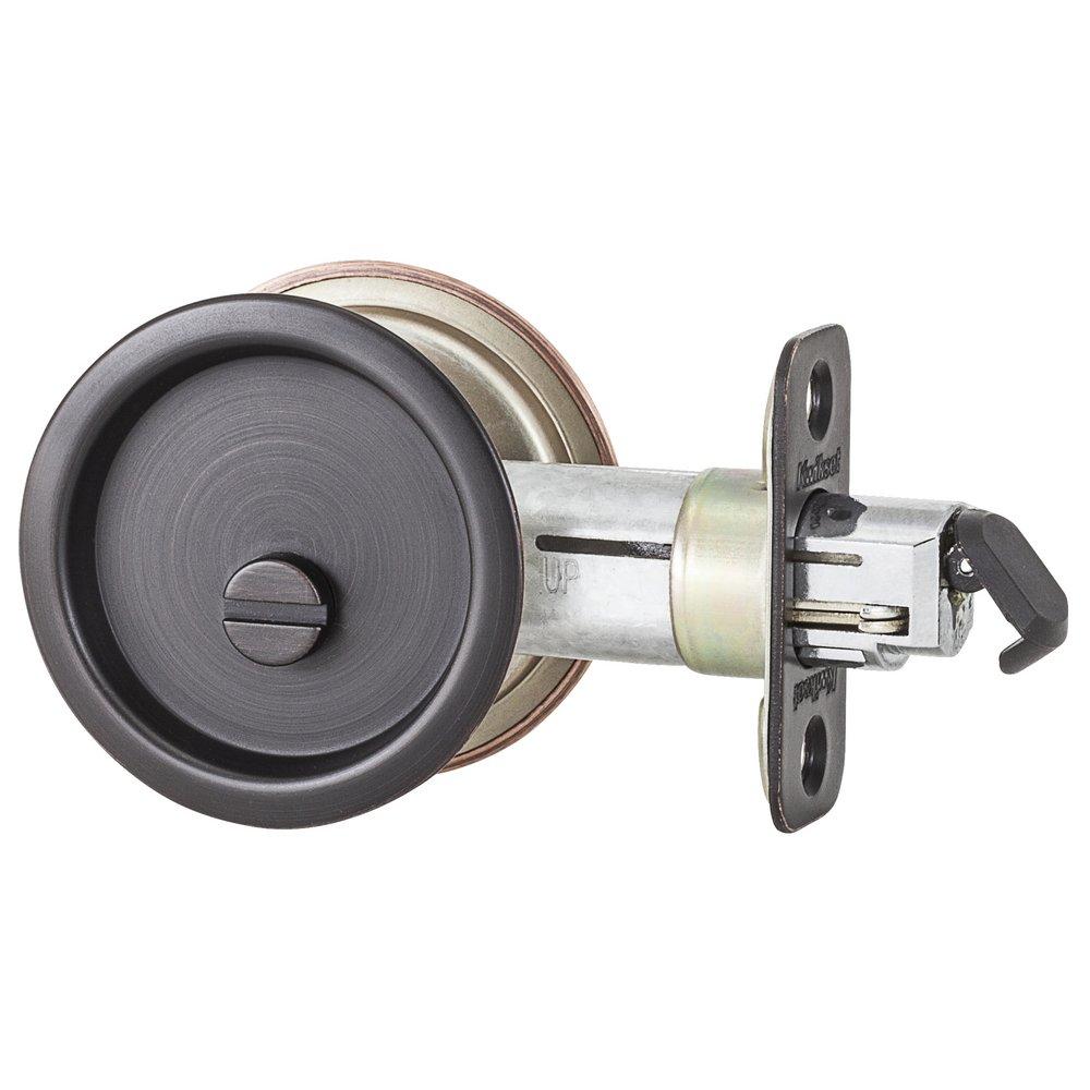 Kwikset Venetian Bronze Round Pocket Door Lock 