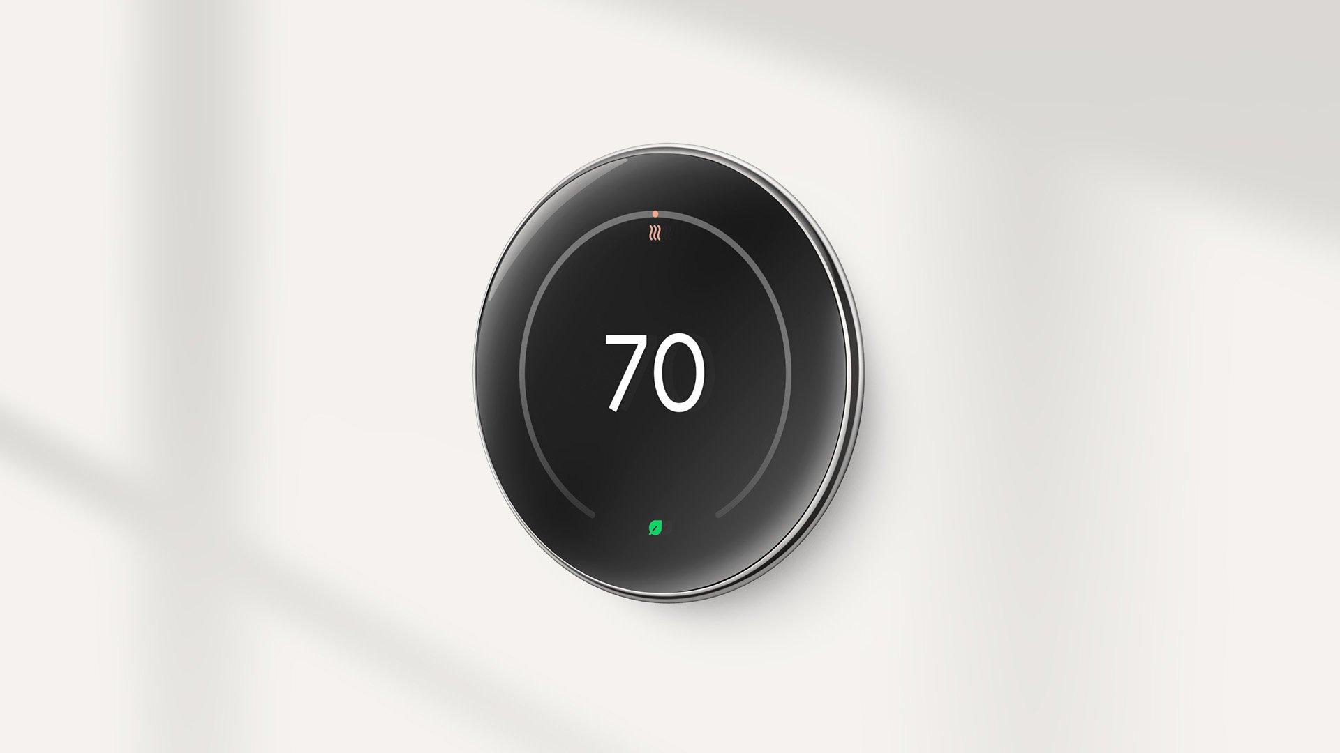 Lifestyle image of Google Nest 4th gen thermostat showing temperature 70.