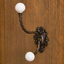 Brass Double Hook with Porcelain Knobs in Antique Brass