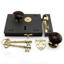 Cast Iron Rim Lock Set with Striped Brown Porcelain Knobs Left Hand in Polished Brass