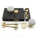 Cast Iron Rim Lock Set with Porcelain Knobs Left Hand in Polished Brass
