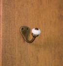 Brass Petite Single Hook with White Porcelain Knob in Antique Brass