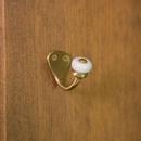Brass Petite Single Hook with White Porcelain Knob in Matte Brass