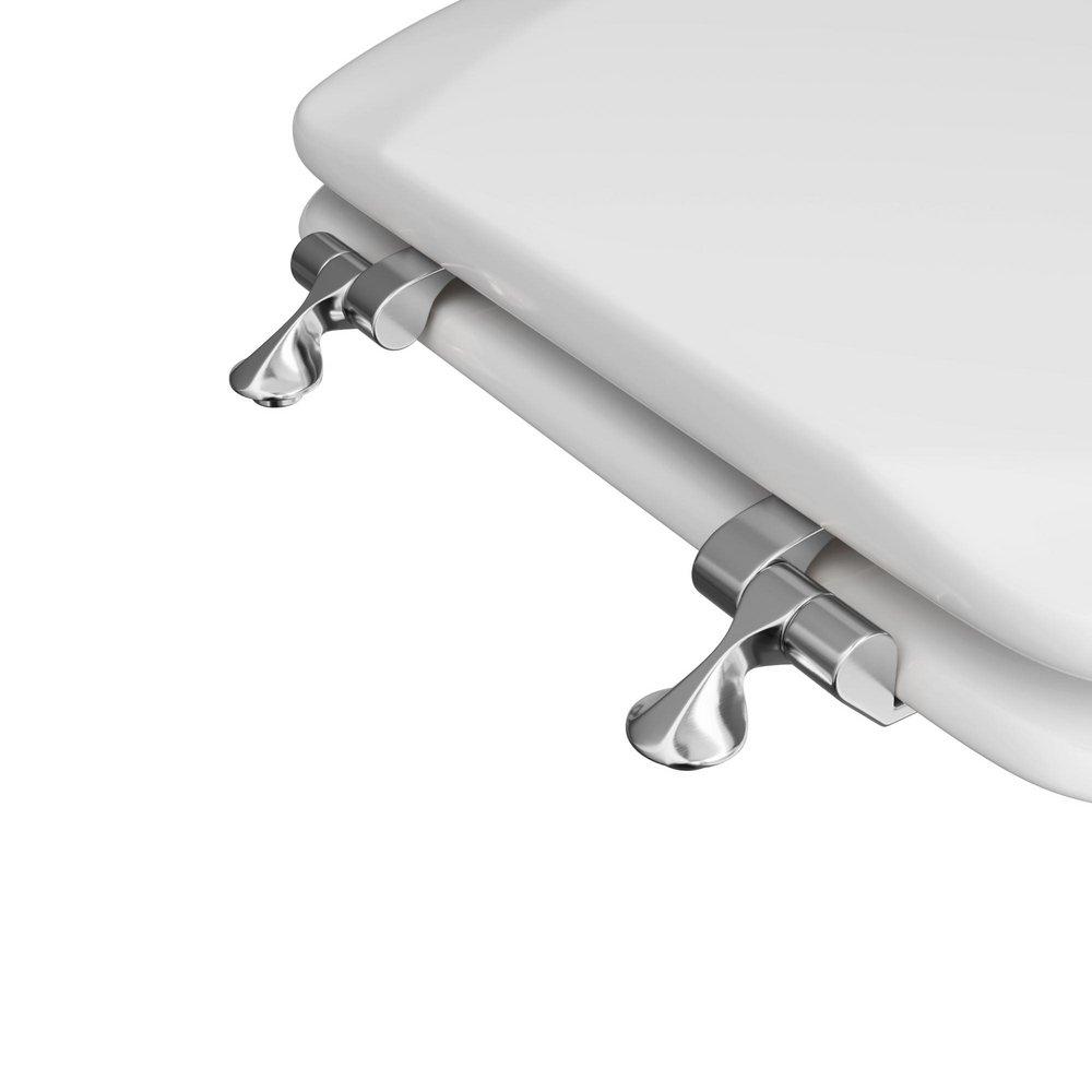 Jones Stephens White Elongated Closed Front with Cover Toilet 