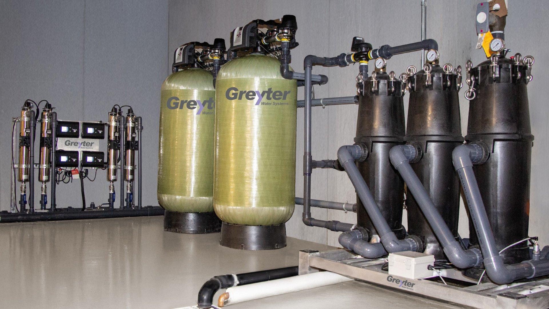 Greyter commercial water recycling modules installed in a commercial building space