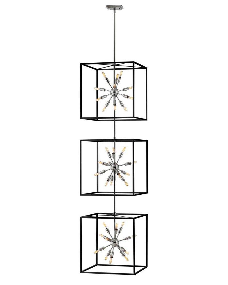 SOME VIEWS ARE BETTER THAN OTHERS. THE STRIKING AROS PENDANT SHOWCASES A PROVOCATIVE MID-CENTURY MODERN STARBURST CLUSTER IN A LUXURIOUS WARM BRASS FINISH FRAMED BY AN ARTICULATING, ANGULAR CAGE IN PR 