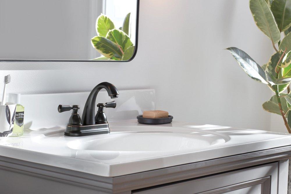 Peerless&reg; Oil Rubbed Bronze Two Handle Centerset Bathroom Sink Faucet 