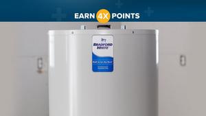 Contractor installs Bradford White residential water heater in home. 