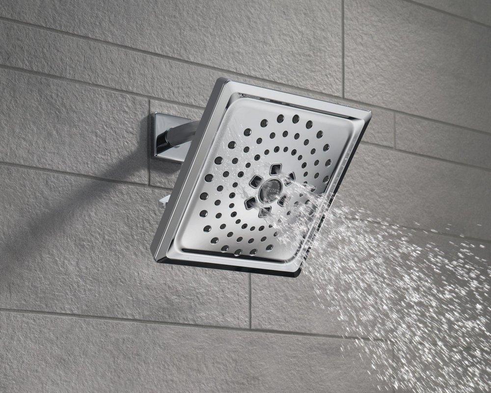 DELTA UNIVERSAL SHOWERING COMPONENTS: H2OKINETIC 3-SETTING RAINCAN SHOWER HEAD 