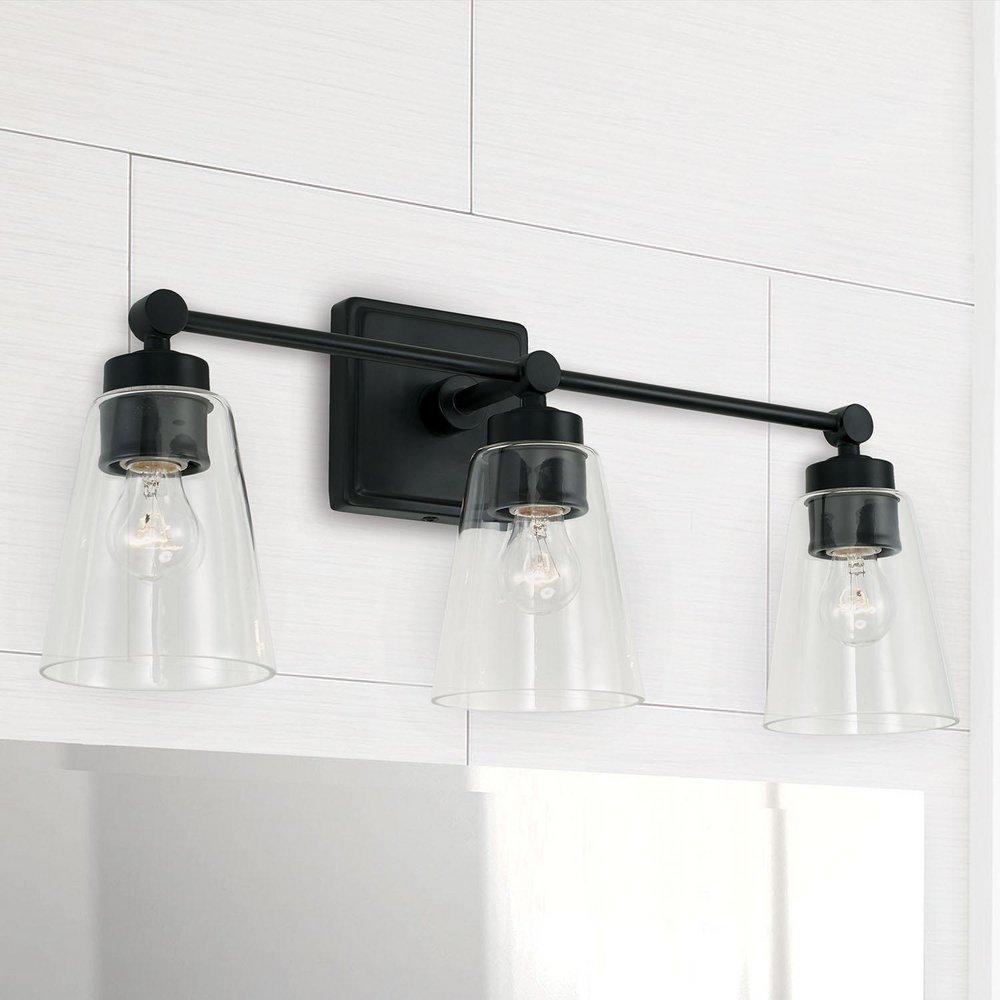 23 3-LIGHT VANITY IN MATTE BLACK WITH CLEAR CONE GLASS SHADES 