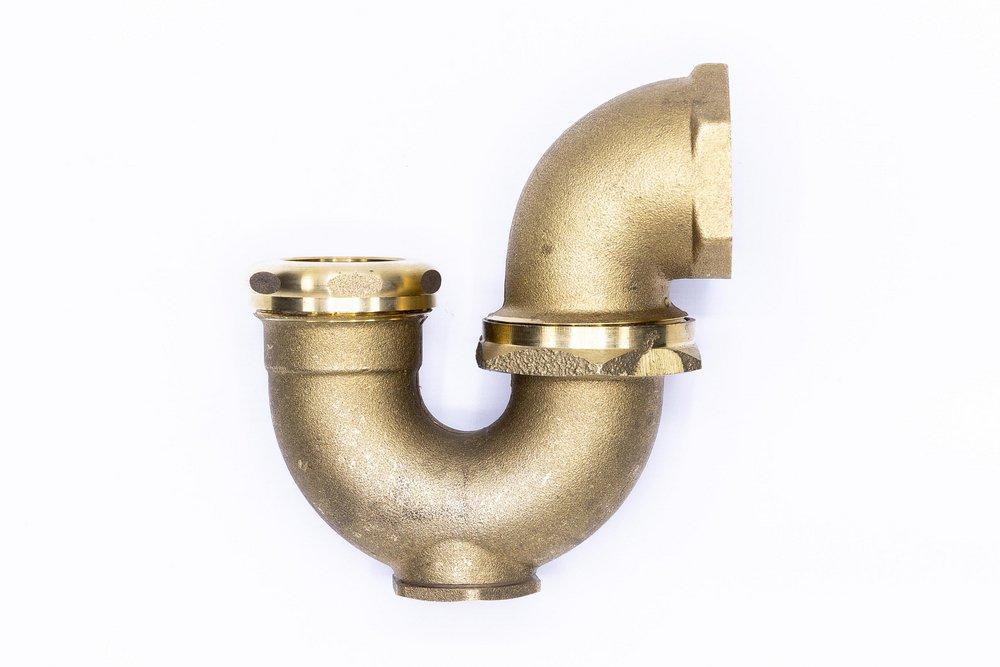 1-1/2 x 1-1/4 in. Cast Brass Sink Trap in Rough Brass 