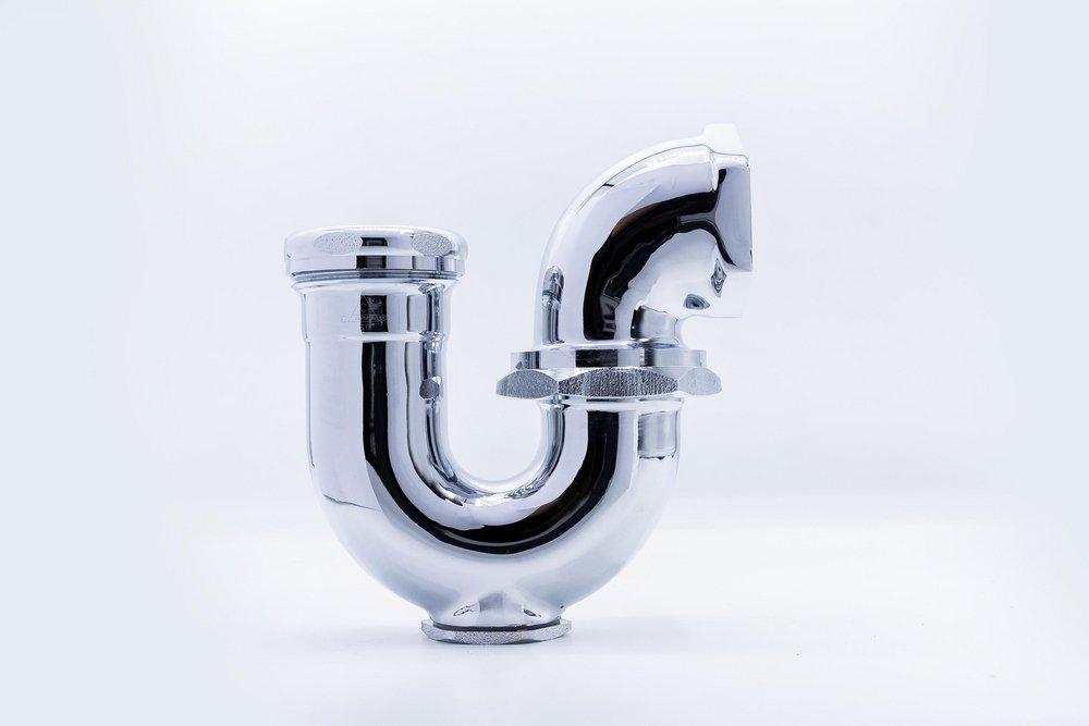 1-1/2 x 1-1/4 in. Cast Brass Sink Trap in Polished Chrome 