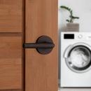 Kwikset Venetian Bronze Passage Lever 