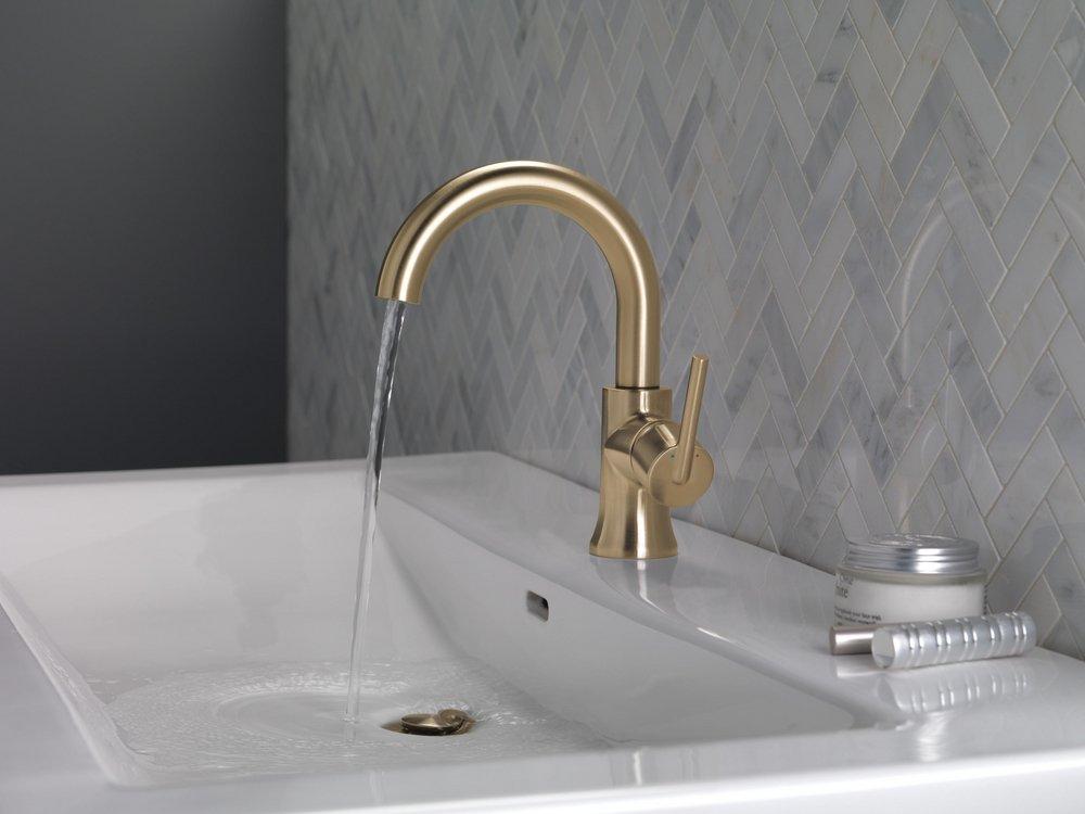 Single Handle Monoblock Bathroom Sink Faucet in Champagne Bronze 