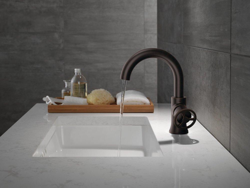 Single Handle Monoblock Bathroom Sink Faucet in Venetian Bronze 