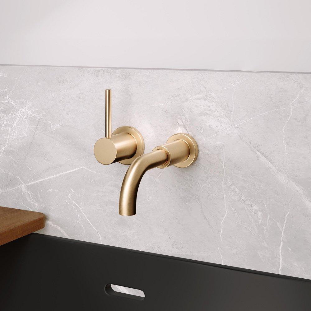 Single Handle Wall Mount Bathroom Sink Faucet in Brushed Gold 