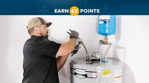 Plumber installs A. O. Smith water heater in residential home. 