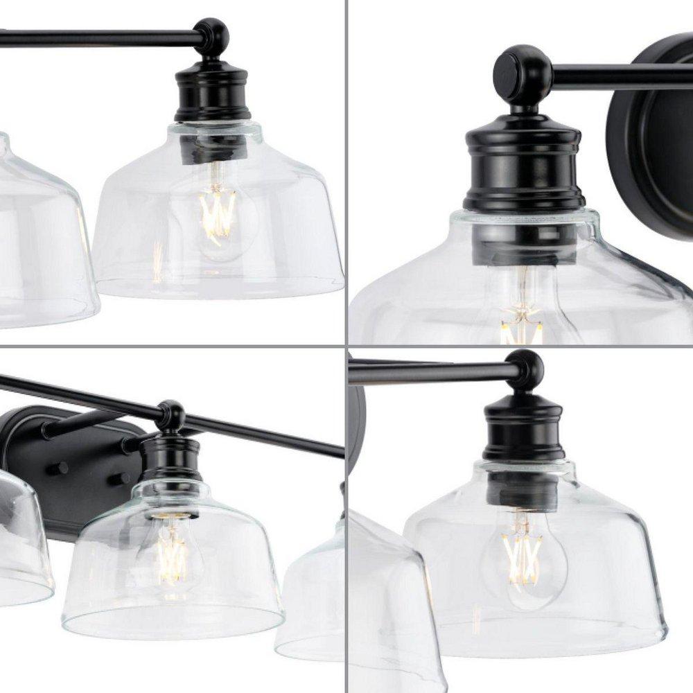 SINGLETON COLLECTION THREE-LIGHT 26.5 MATTE BLACK FARMHOUSE VANITY LIGHT WITH CLEAR GLASS SHADES 