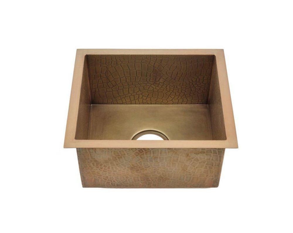 RECTANGULAR HAND HAMMERED SEAMLESS CONSTRUCTION SOLID COPPER SINK WITH ANTIQUE SATIN GOLD FINISH AND A CROCODILE INSPIRED TEXTURE 