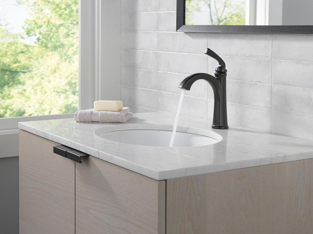 Single Handle Monoblock Bathroom Sink Faucet in Matte Black 
