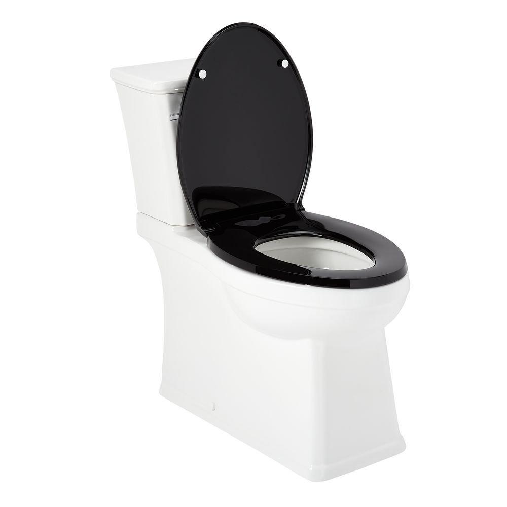 1.28 gpf Elongated Two Piece Skirted Toilet in White 
