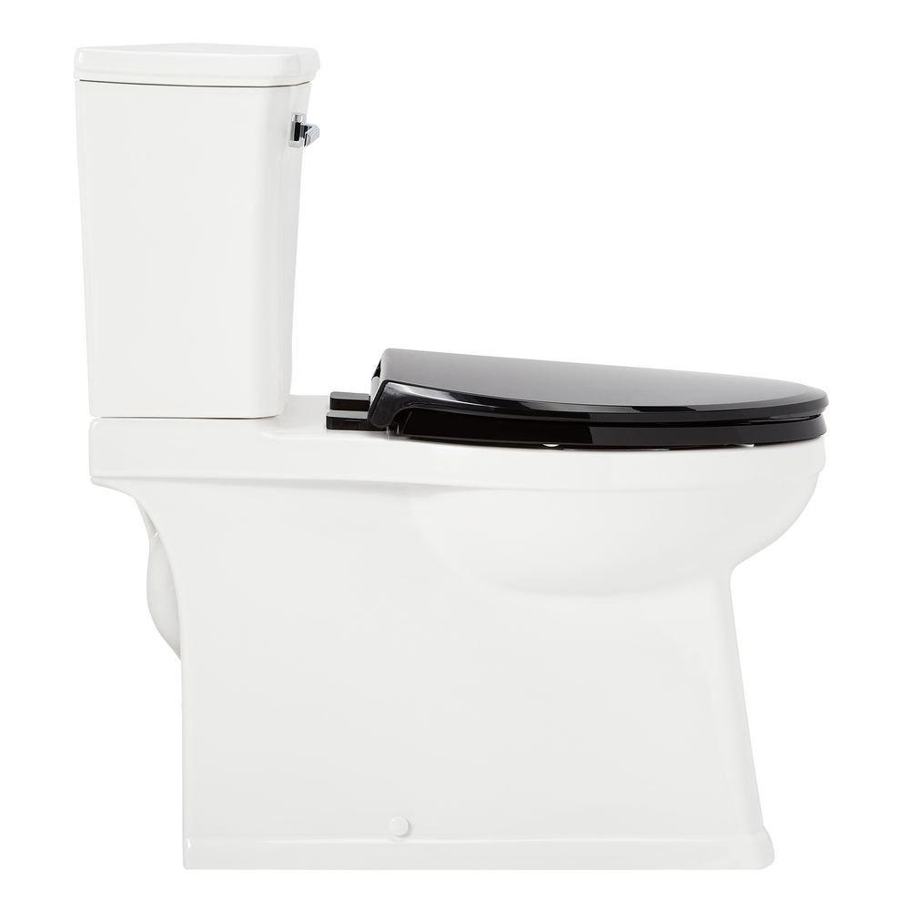 1.28 gpf Elongated Two Piece Skirted Toilet in White 
