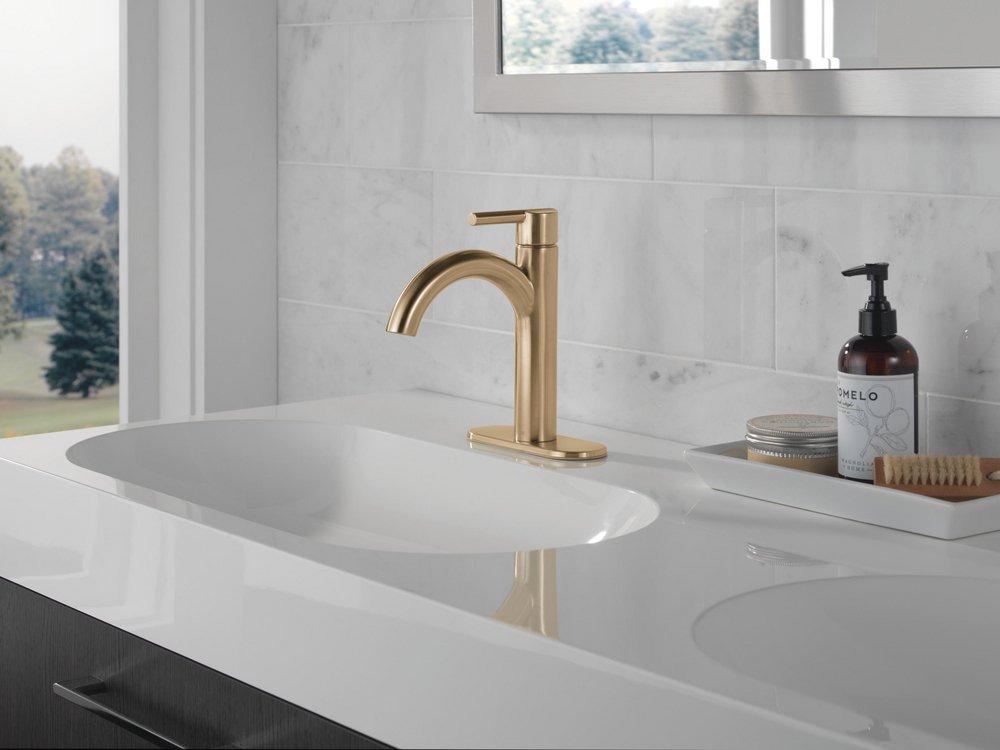 Single Handle Monoblock Bathroom Sink Faucet in Champagne Bronze 