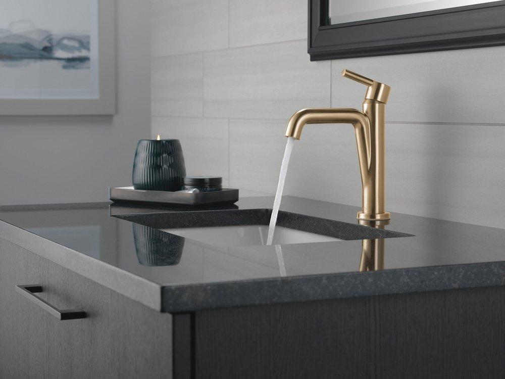 Single Handle Monoblock Bathroom Sink Faucet in Champagne Bronze 