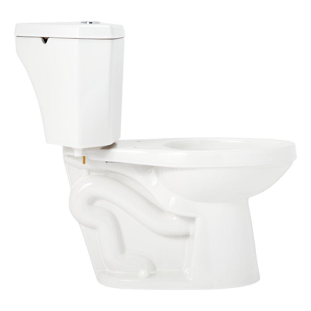 1.28 gpf Elongated Two Piece Corner Toilet in White 