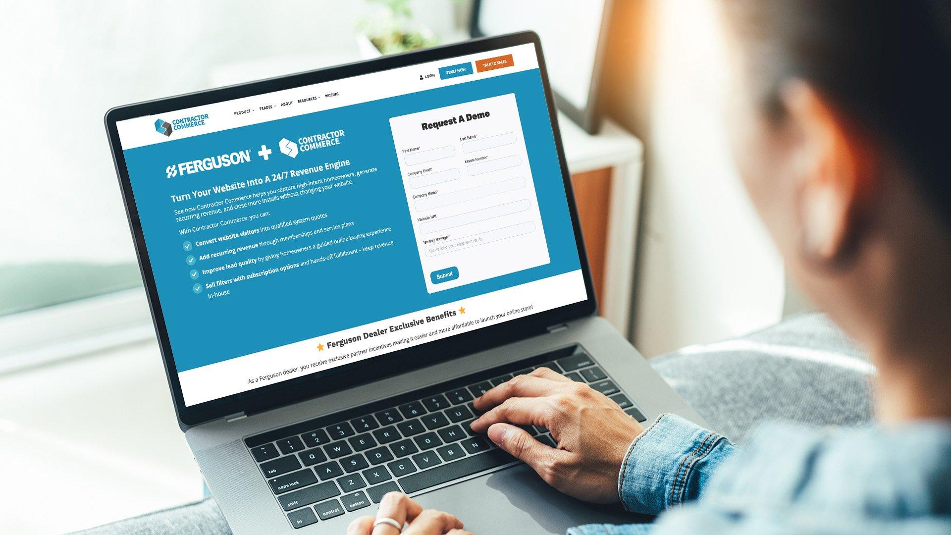 Customer peers over open laptop with Ferguson and Contractor Commerce information web page opened. 