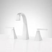 A widespread white bathroom sink faucet.