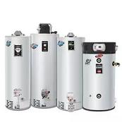 A row of four stainless steel water heaters.