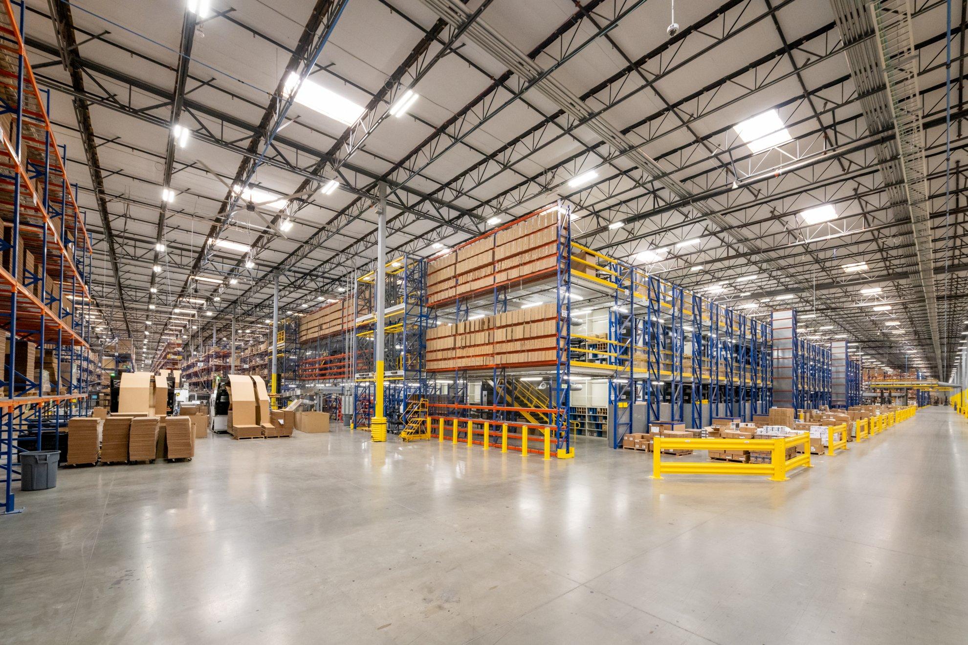 Rows of shelving in a clean, well-lit Ferguson distribution center.