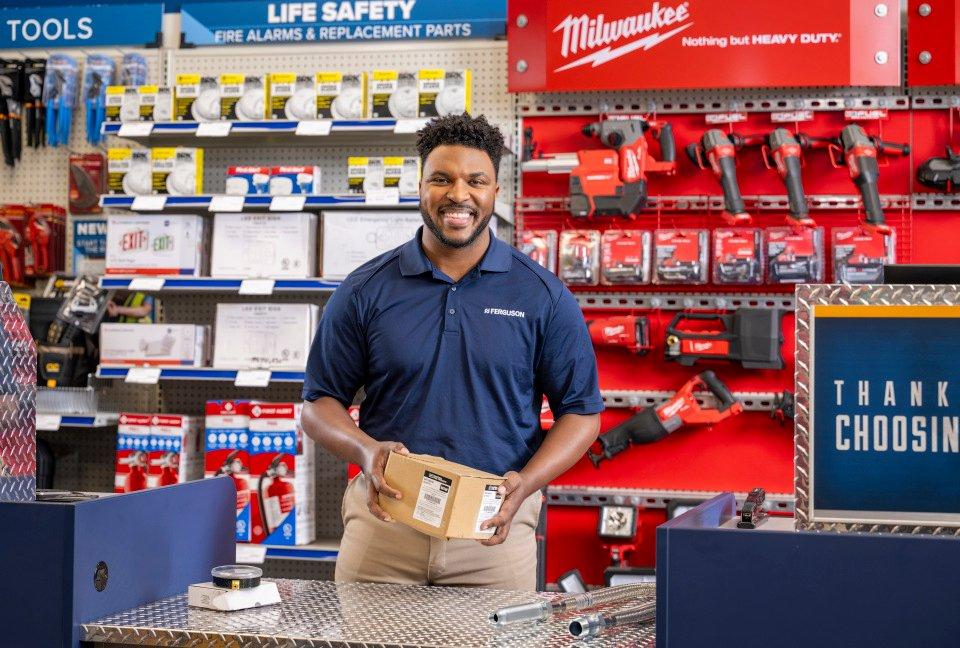 Ferguson Associate behind counter