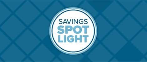 Graphic of a white circle on a blue tile background with Savings Spotlight written in it.