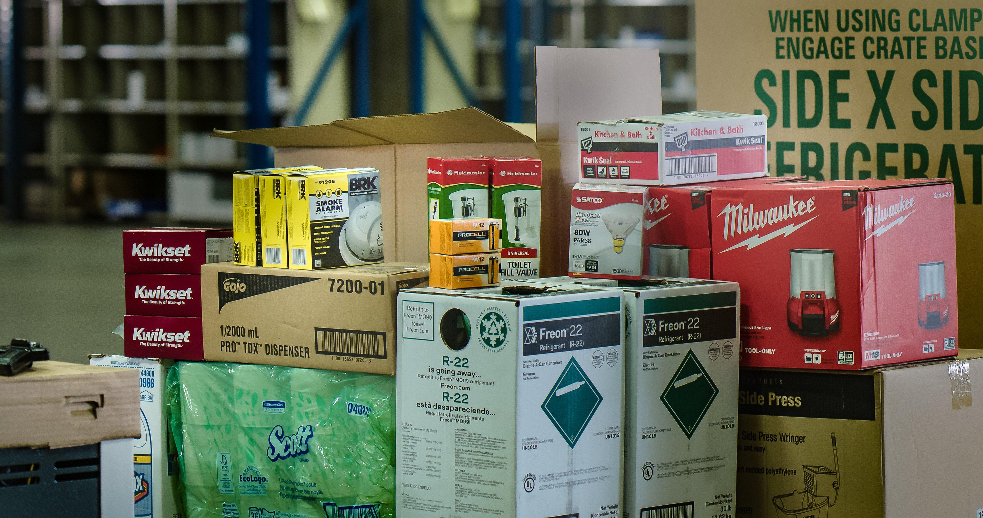 An assortment of Facilites Supply products stacked on top of each other in Front Royal distribution center.