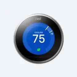 A Nest smart thermostat displaying 75 degrees on a blue background.
