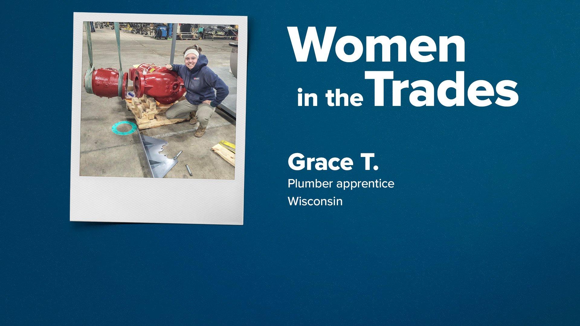 Grace Toller smiles next to red underground pipe connectors in a warehouse facility.